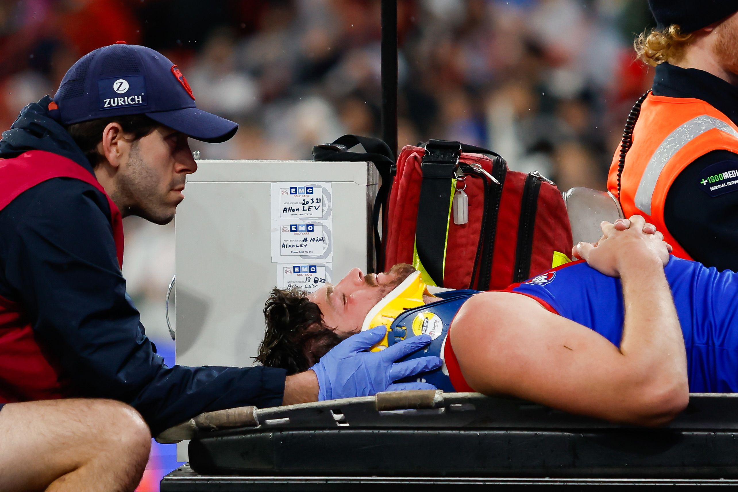 MELBOURNE, AUSTRALIA - SEPTEMBER 07: Angus Brayshaw of the Demons leaves the field on a stretcher during the 2023 AFL First Qualifying Final match between the Collingwood Magpies and the Melbourne Demons at Melbourne Cricket Ground on September 07, 2023 in Melbourne, Australia. (Photo by Dylan Burns/AFL Photos via Getty Images)