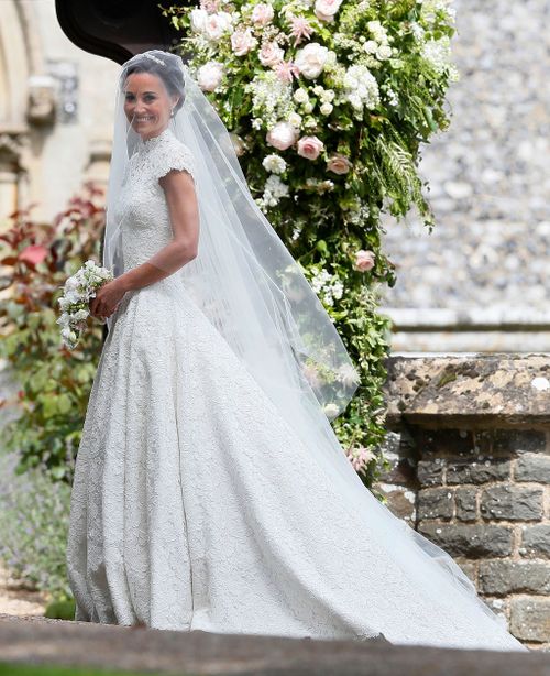 The bride wore a gown by British designer Giles Deacon. (AAP)