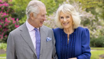 King Charles III and Queen Camilla stand in Buckingham Palace Gardens on Wednesday April 10, 2024, the day after their 19th wedding anniversary.    