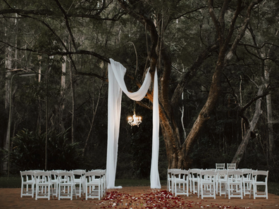 One of the wedding ceremony spots is under the Jacaranda Tree surrounded by amazing rainforest gardens.