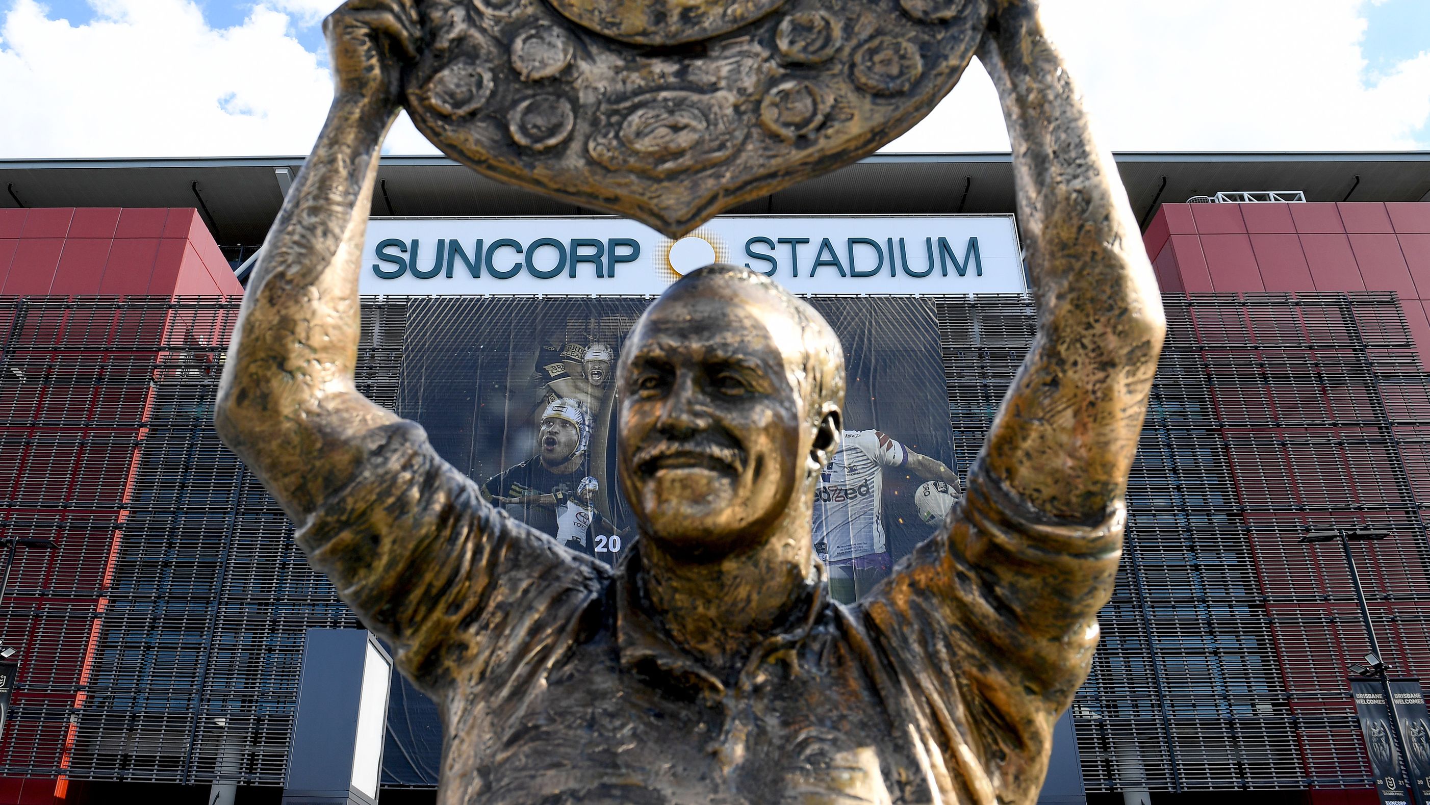 A view of the stadium through the Wally Lewis statue.