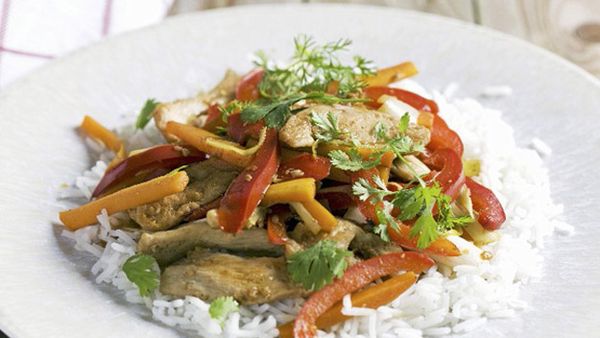 Stir-fried chicken with peppers and rice