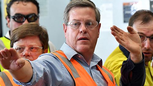 Queensland Opposition Leader Tim Nicholls (centre). (AAP)