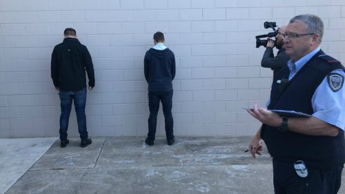 New inmates are checked over before entering the prison. Picture: 9NEWS