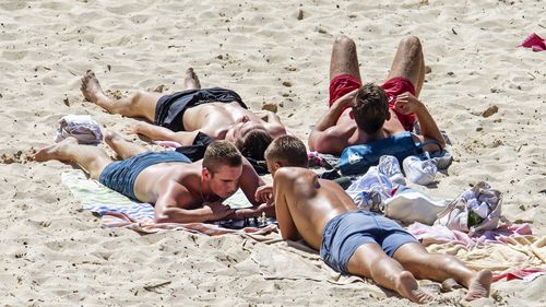 People are seen playing chess at Bondi Beach on March 20, 2020 in Sydney, Australia. 