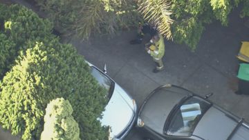 A toddler and a woman have been rescued after becoming trapped in a driveway emergency in Edgewater, WA