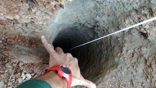 The 30 centimeters wide borehole in which a two-year-old fell down in the town of Totalan in Malaga, southeastern Spain.