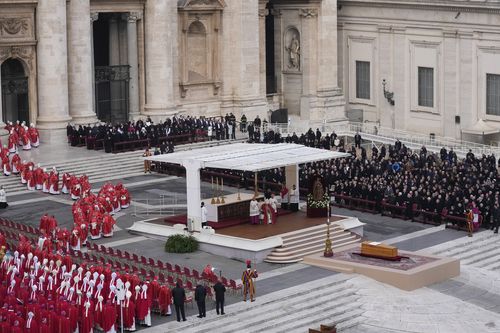 Pope Francis, centre, starts a funeral mass as the coffin of late Pope Emeritus Benedict XVI is placed at St. Peter's Square at the Vatican, Thursday, Jan. 5, 2023.  