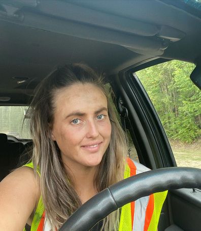 Gold digger Tyler Mahoney covered in dirt in her car.