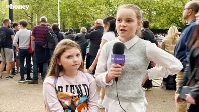 Young British children tell 9Honey about their admiration for Queen Elizabeth, what they learnt about her at school and why they wanted to pay tribute to Her Majesty at Buckingham Palace