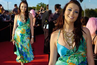 The bright blue eyeshadow, the layered neckpieces and the mermaid-inspired satin halter are obvious signs that Ricki-Lee was pretty excited to be at the 2008 ARIA Awards.