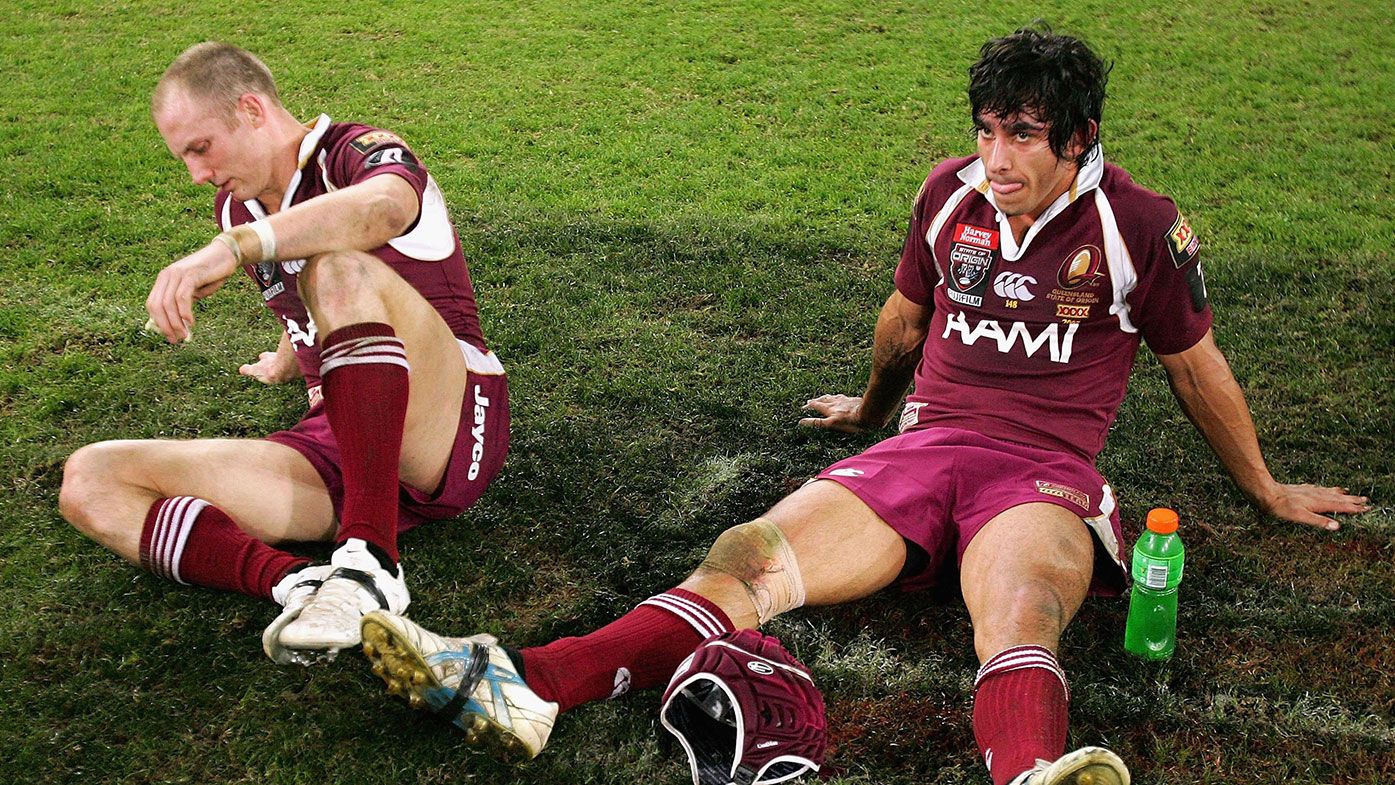 Darren Lockyer (left) and Johnathan Thurston after a State of Origin loss.