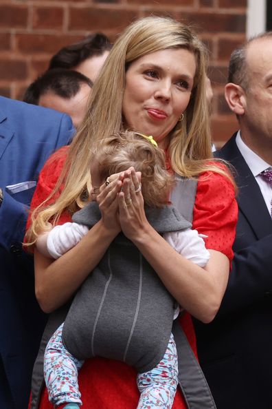 Culture Secretary Nadine Dorries stands beside Carrie Johnson and baby Romy as Prime Minister Boris Johnson addresses the nation to announces his resignation outside 10 Downing Street, on July 7, 2022 in London, England. 
