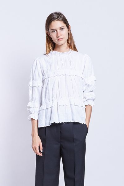 Isabel Marant Etoile top $655 at <a href="https://www.incu.com/products/isabel-marant-etoile-daniela-white" target="_blank">Incu</a><br>