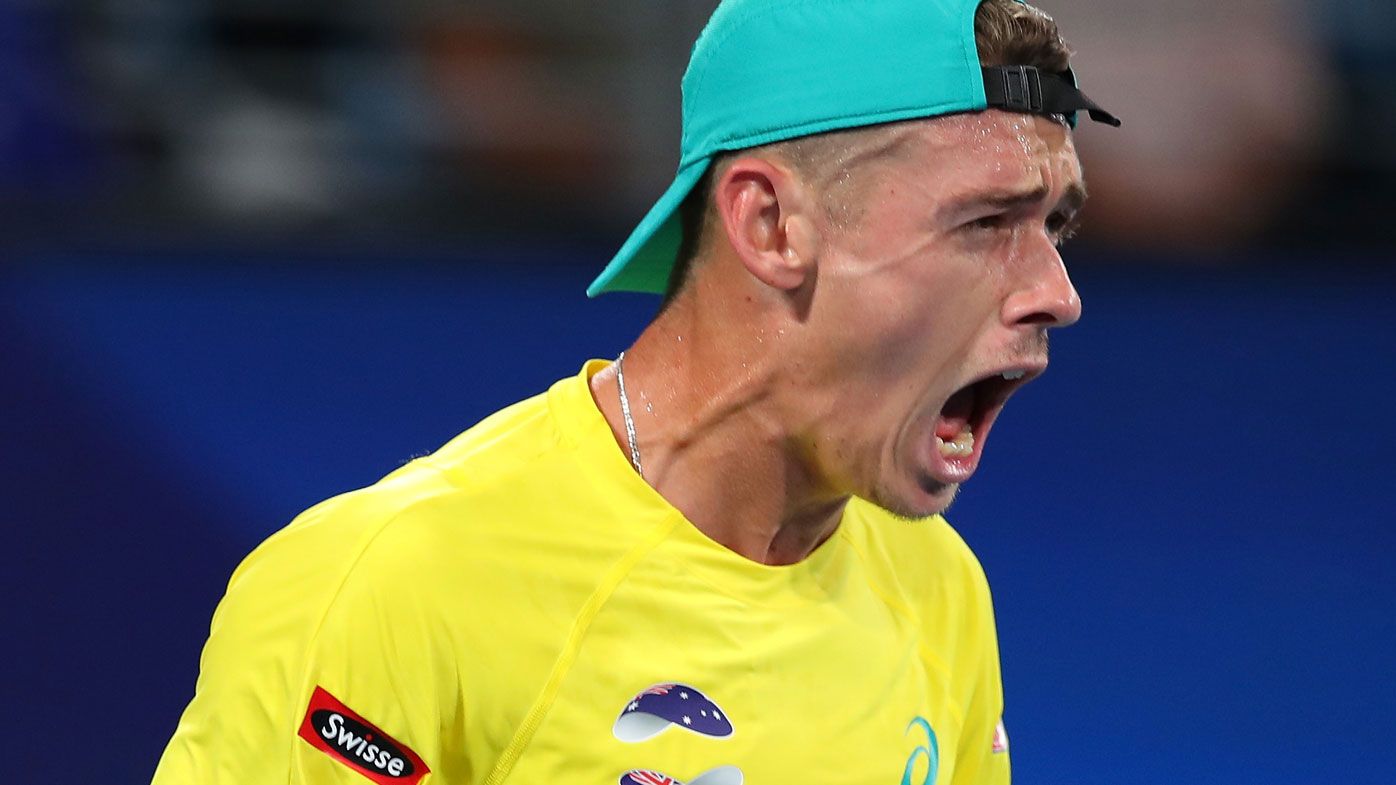 Alex de Minaur of Australia celebrates winning a point 