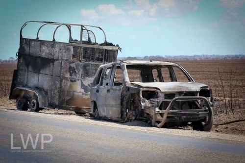 The burnt-out shell of a car, towing a horse float. (Image courtesy of Levi Williams)