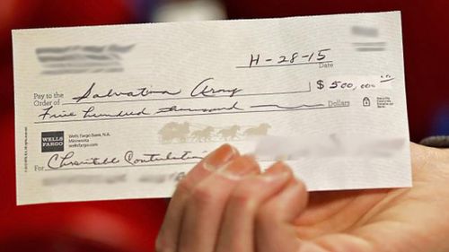 Anonymous couple leaves half a million dollar cheque inside charity collection bucket