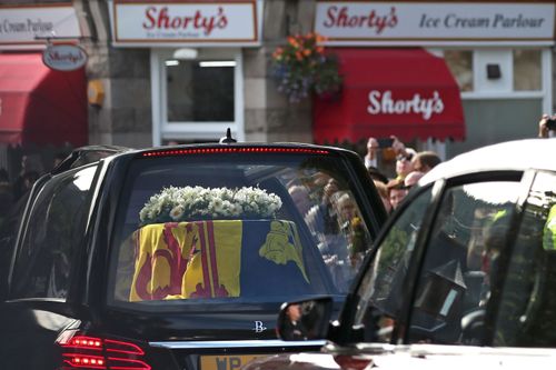 The hearse carrying the coffin of Queen Elizabeth II makes its journey to Edinburgh from Balmoral in Scotland.