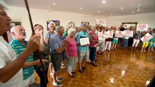 Retirement village residents are protesting plans to build a crematorium just metres from their homes.