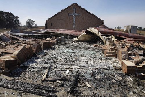 The remains of St. Andrew's church are scattered after it was destroyed by fire in the community of Kinglake, northeast of Melbourne on February 9, 2009