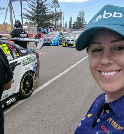 Emily Duggan race car driver trackside