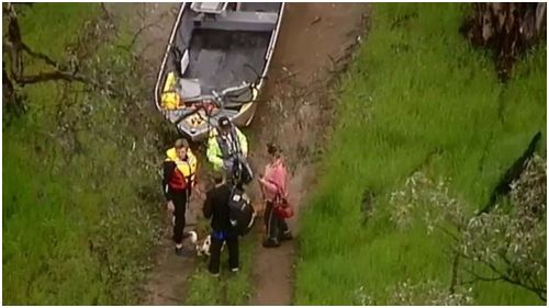 Two people and dogs rescued from floodwaters in Toolamba, near Shepparton