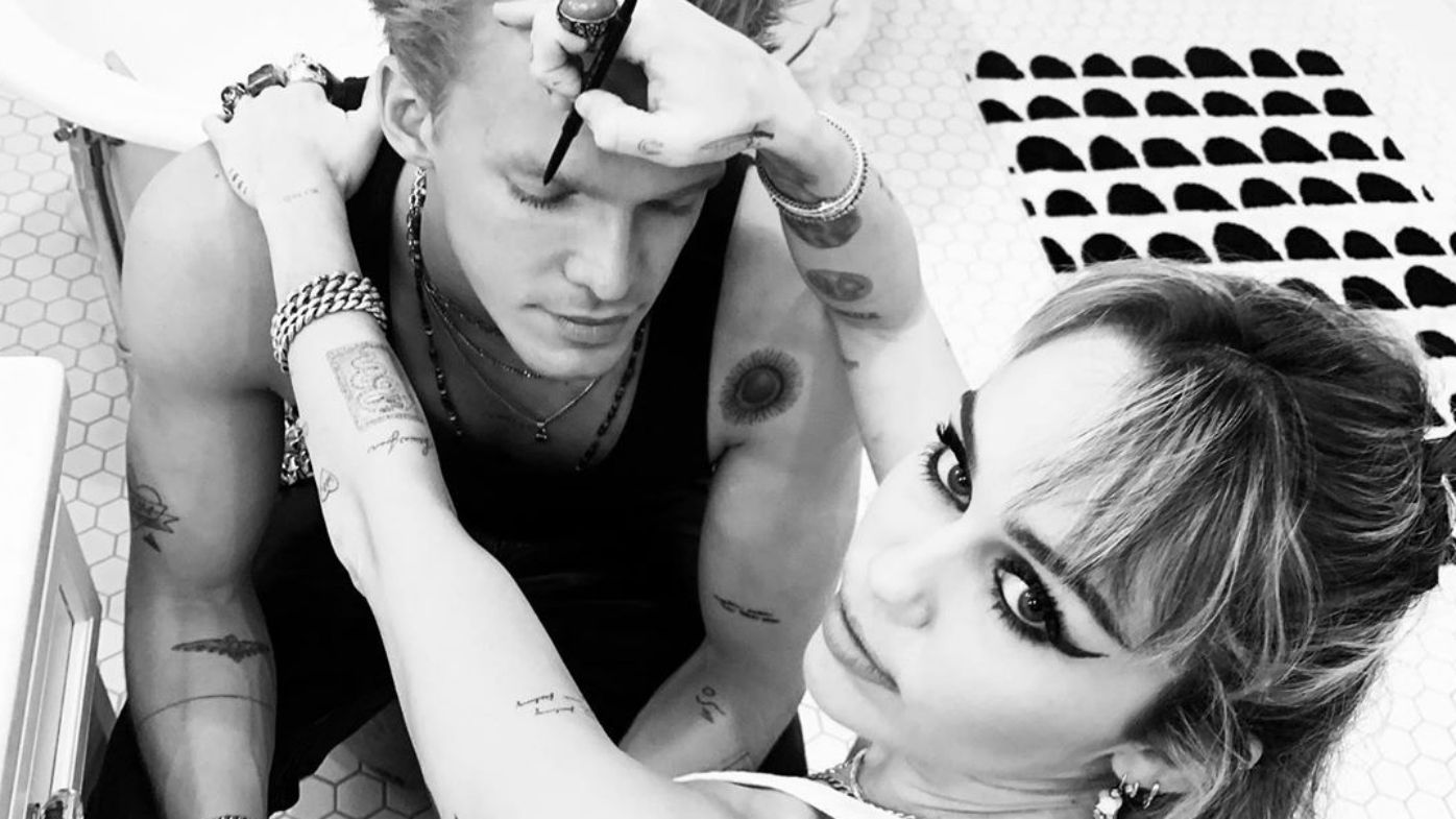 Miley Cyrus' boyfriend Cody Simpson is 'by her side' during vocal cord(00)