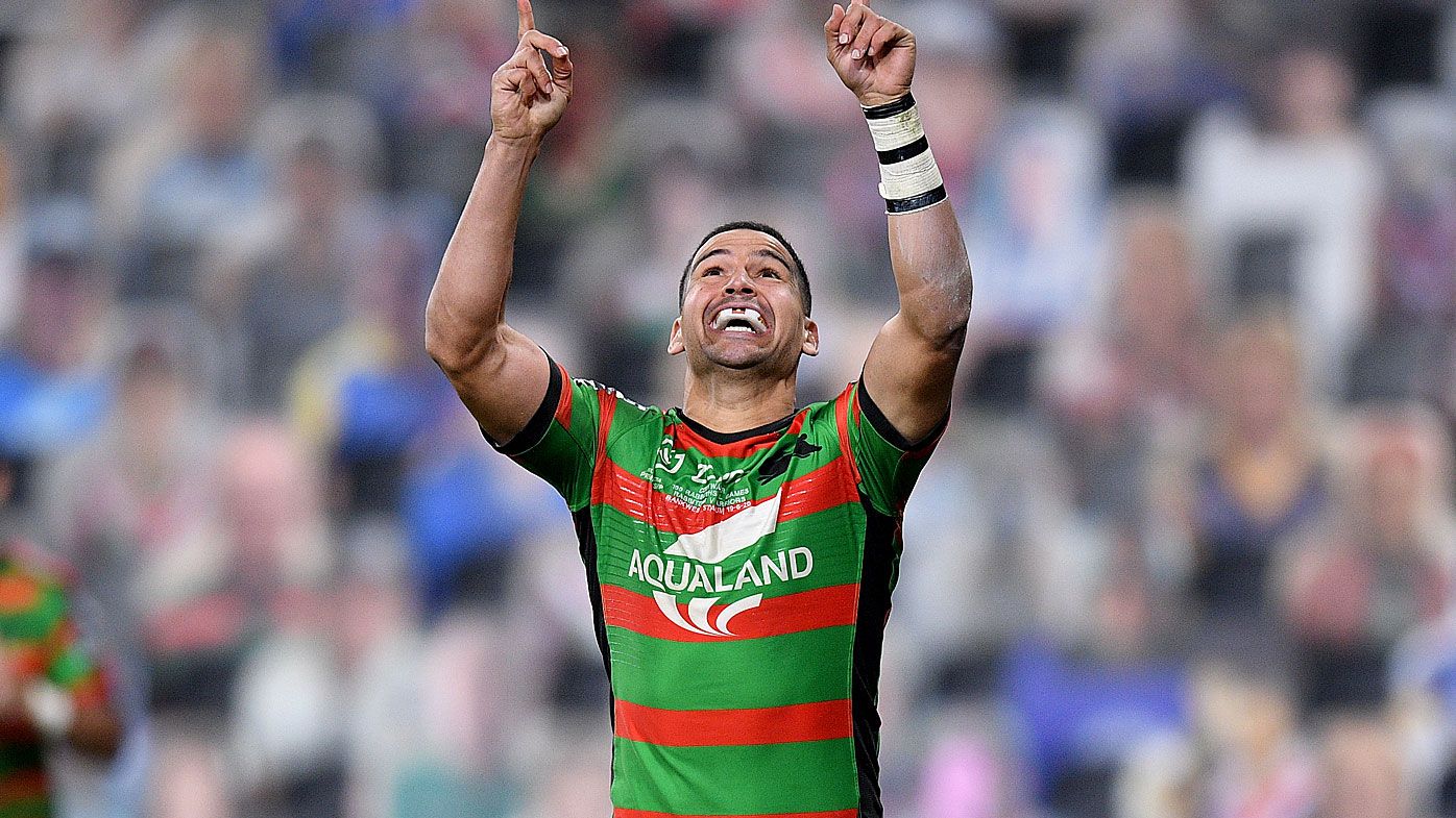 Cody Walker of the Rabbitohs celebrates after scoring a try