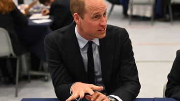 BIRMINGHAM, ENGLAND - APRIL 25: Britain&#x27;s Prince William, Prince of Wales speaks with students using the &quot;Talking Tables&quot; initiative, during a visit to St. Michael&#x27;s Church of England High School in Rowley Regis, on April 25, 2024. During his visit Prince William, Prince of Wales will learn about the award-winning student-led initiatives available to pupils to support their mental health and wellbeing. (Photo by Oli Scarff - WPA Pool/Getty Images)