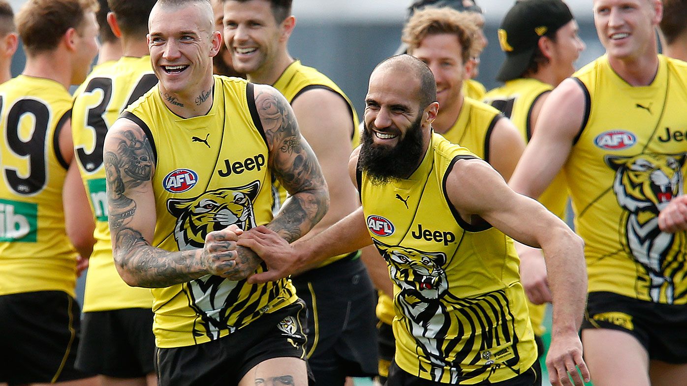 Dustin Martin and Bachar Houli of the Tigers share a joke during a Richmond Tigers AFL training