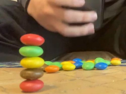 Will Cutbill broke the record for the most M & Ms stacked in a tower.