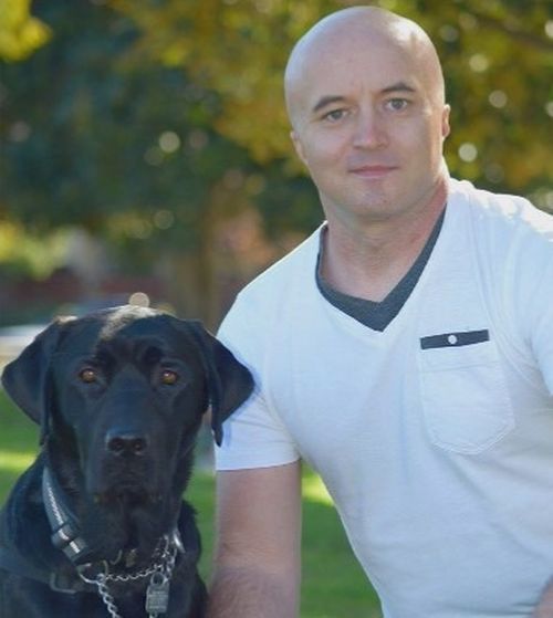 David Pearce and his English Labrador, Gunner, were denied entry to a Chinese restaurant Juicy Bao Bao on Friday.﻿