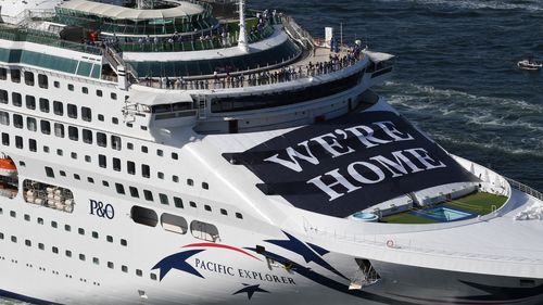 P&O Cruises Australia's flagship Pacific Explorer enters Sydney Harbour displaying a banner emblazoned across her front on April 18, 2022 in Sydney, Australia. Pacific Explorer's arrival marks the return of cruising in Australia following a two-year hiatus following the coronavirus pandemic. (Photo by James D. Morgan/Getty Images for P&O Cruises)