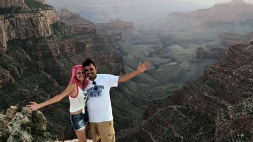 The 'travel obsessed' couple pose at the Grand Canyon. (Facebook)