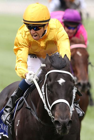 Joao Moriera reacts to winning the Coolmore Stud Stakes on Brazen Beau. (Getty)