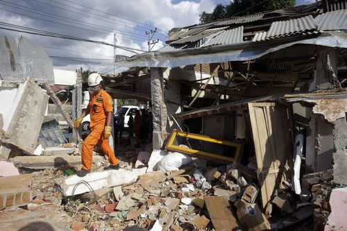 Entire homes were left crumbled or flattened by the tremor. Picture: AAP.