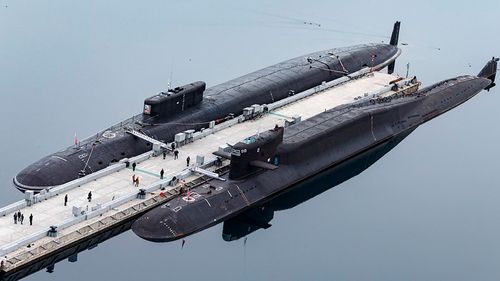 Russian nuclear submarines Prince Vladimir and Yekaterinburg prepare to set off from a Russian naval base in Gazhiyevo on the Kola Peninsula