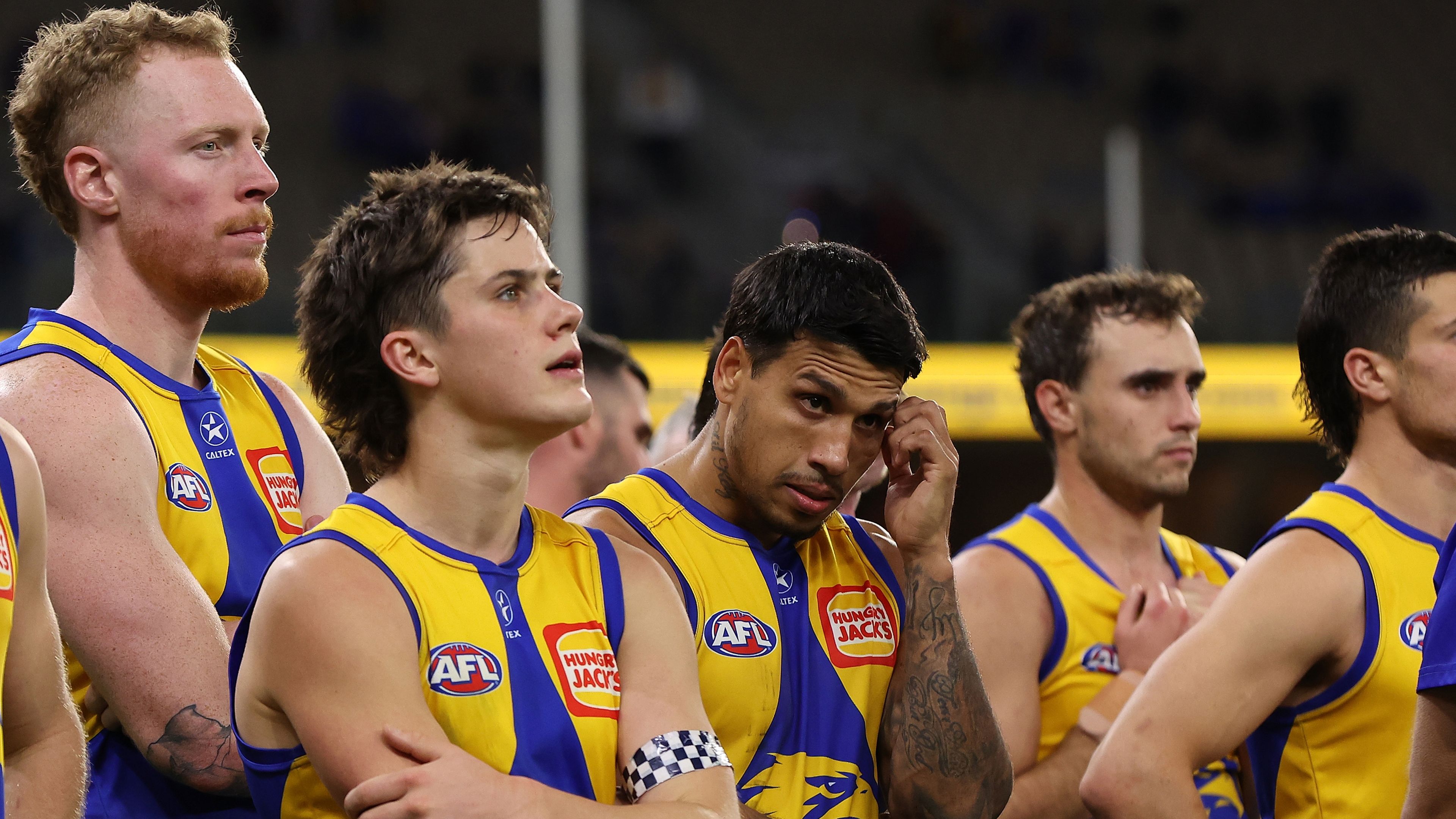 PERTH, AUSTRALIA - AUGUST 12: The Eagles look on after being defeated during the round 22 AFL match between West Coast Eagles and Fremantle Dockers at Optus Stadium, on August 12, 2023, in Perth, Australia. (Photo by Paul Kane/Getty Images)