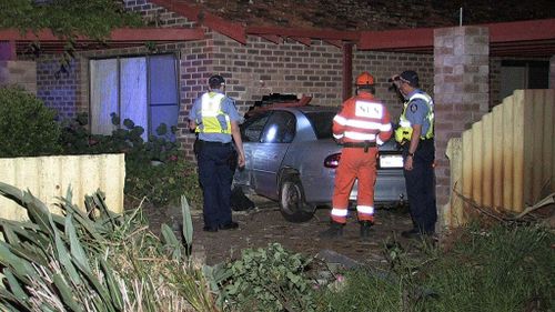 Man wanted by police after crashing car into Perth house before fleeing