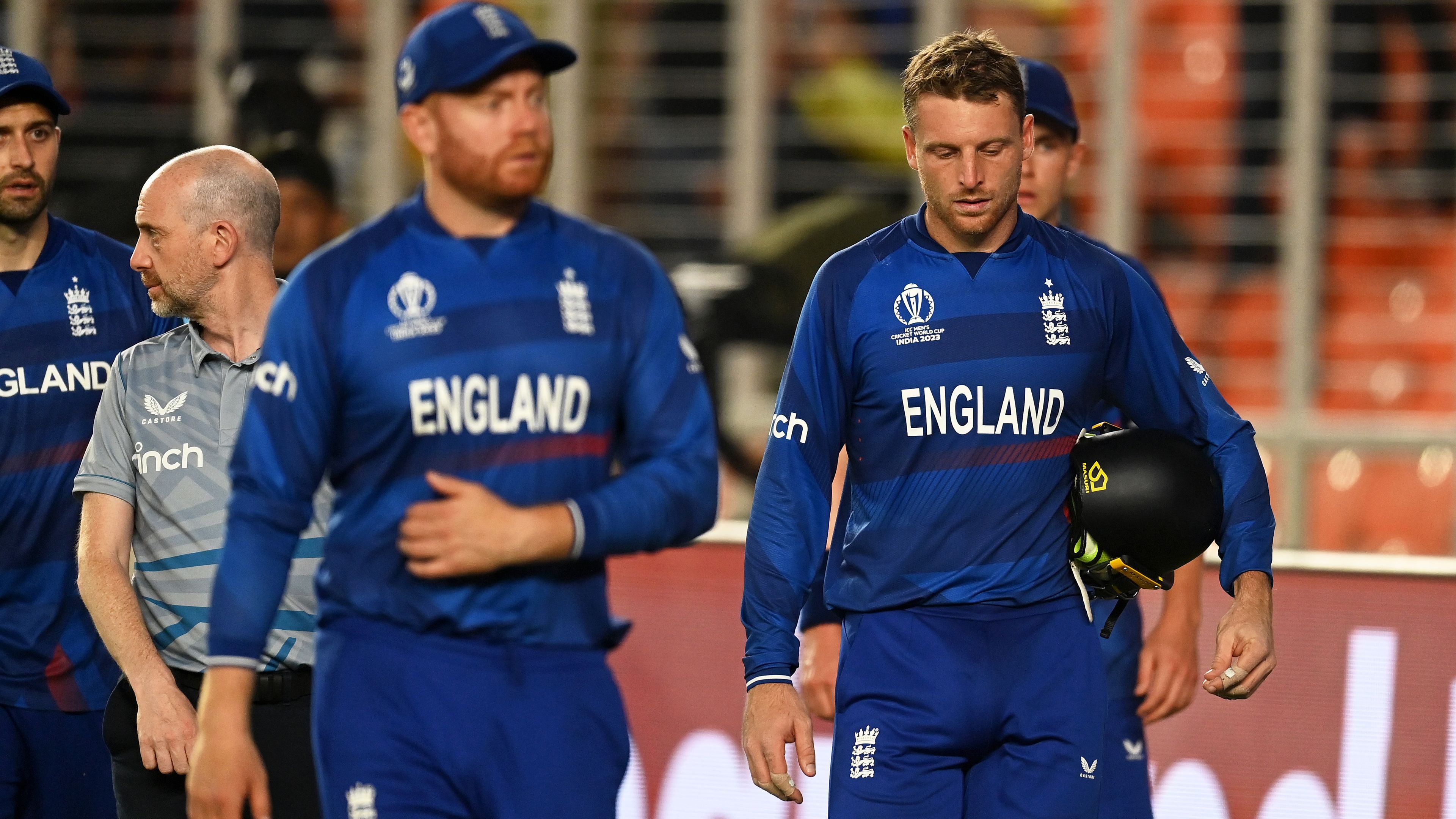 Jos Buttler of England cuts a dejected figure after losing to New Zealand.