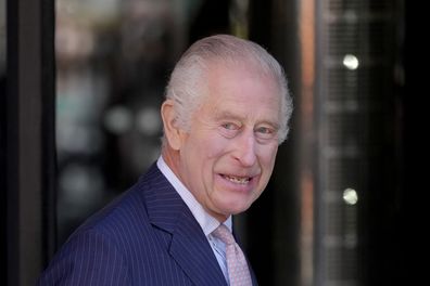 King Charles III smiles as he arrives for a visit to University College Hospital Macmillan Cancer Centre in London, Tuesday, April 30, 2024. 