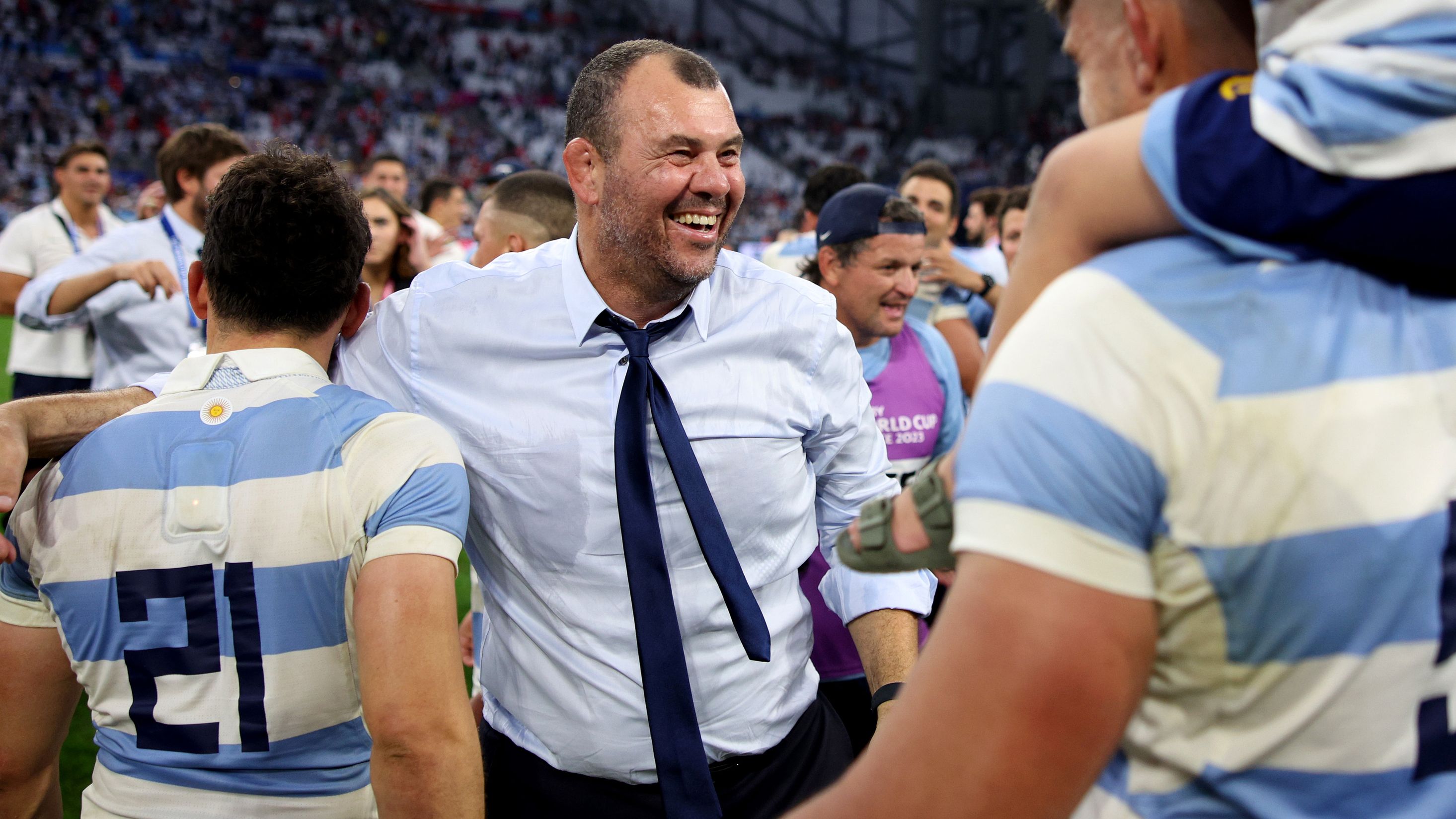Michael Cheika of Argentina, celebrates with the team following their victory.