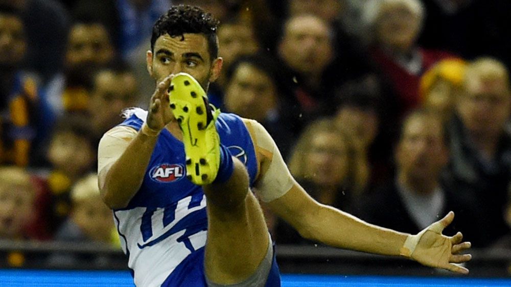 AFL: Kangaroos Thomas kicks 'miracle' goal against Crows
