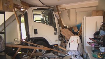 A Gold Coast family has narrowly avoided a school holiday tragedy after a truck careered through a fence and decimated the front of their home.