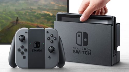 The Switch can also be connected to a TV via a dock and its controllers attached to a traditional gamepad controller. (Nintendo)
