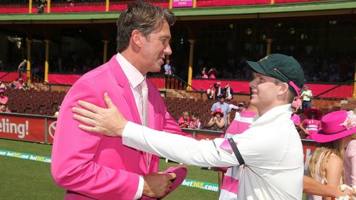 Glenn McGrath and Steve Smith share a moment before play. (Getty)