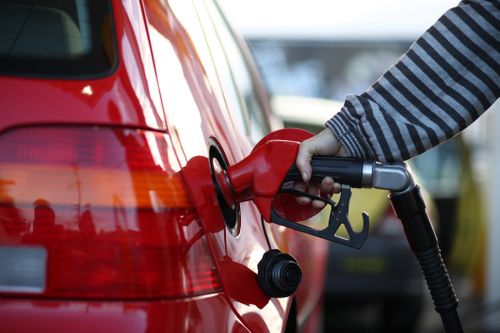 Women filling up at petrol station