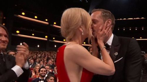 Kidman kissed Skarsgard on the lips in front of her husband at the Emmy Awards. (CBS)