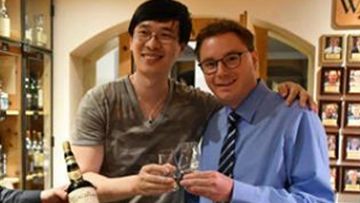 Chinese author Zhang Wei and Sandro Bernasconi, manager of the Waldhaus Am See hotel. (Photo: Facebook).