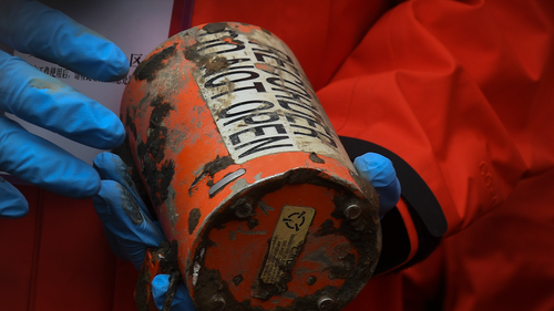 The second orange-colored "black box" recorder recovered at the China Eastern flight crash site in Tengxian County on March 27, 2022, in southern China's Guangxi Zhuang Autonomous Region.